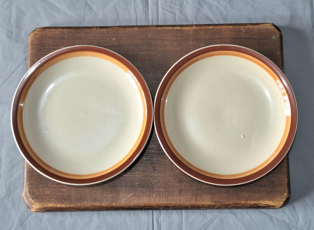 Pair of stoneware dessert plates (Category: Coffee & Tea Tableware) located in La Trinidad. Submitted by styled.traded (Listing ID 1337329837, Image 1). Description: D: 7.5" one with hairline crack, but still useable..