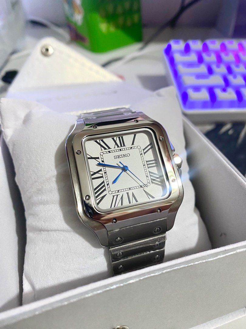 Seiko Mod Santos (Category: Luxury Watches) located in Manila. Submitted by jey09 (Listing ID 1337376258, Image 2). Description: Seiko Mod Cart Santos •Brand new •38mm •Seiko Nh35 Movement •With box and paper bag •Complete links Price: ₱5500 Meetup: Sm Fairview Qc Fb page: On The Wrist Mop: Gcash, Maya or Bank Transfer Courier: Lbc, Lalamove or j&t.