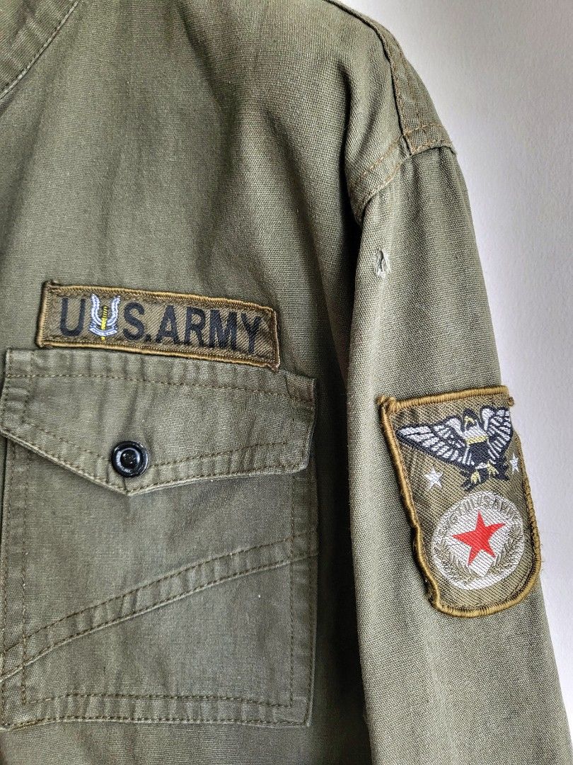 US Army Green Military Field Jacket M65 (Category: Coats, Jackets and Outerwear) located in Makati City. Submitted by RedStore (Listing ID 1337259775, Image 2). Description: US Army Green Military Field Jacket (M-L) Excellent Condition Buttons, zipper, collar and cuffs in great condition Badges in excellent shape Actual size via tape measure Width 24.5 Length 28.5 Pinhole near the arm patch (see pic) 9/10 Color rate Php 800 Call /text 09299560779