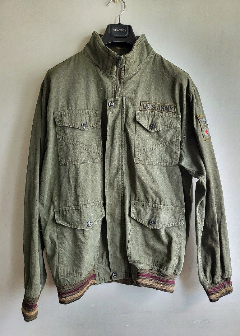 US Army Green Military Field Jacket M65 (Category: Coats, Jackets and Outerwear) located in Makati City. Submitted by RedStore (Listing ID 1337259775, Image 1). Description: US Army Green Military Field Jacket (M-L) Excellent Condition Buttons, zipper, collar and cuffs in great condition Badges in excellent shape Actual size via tape measure Width 24.5 Length 28.5 Pinhole near the arm patch (see pic) 9/10 Color rate Php 800 Call /text 09299560779