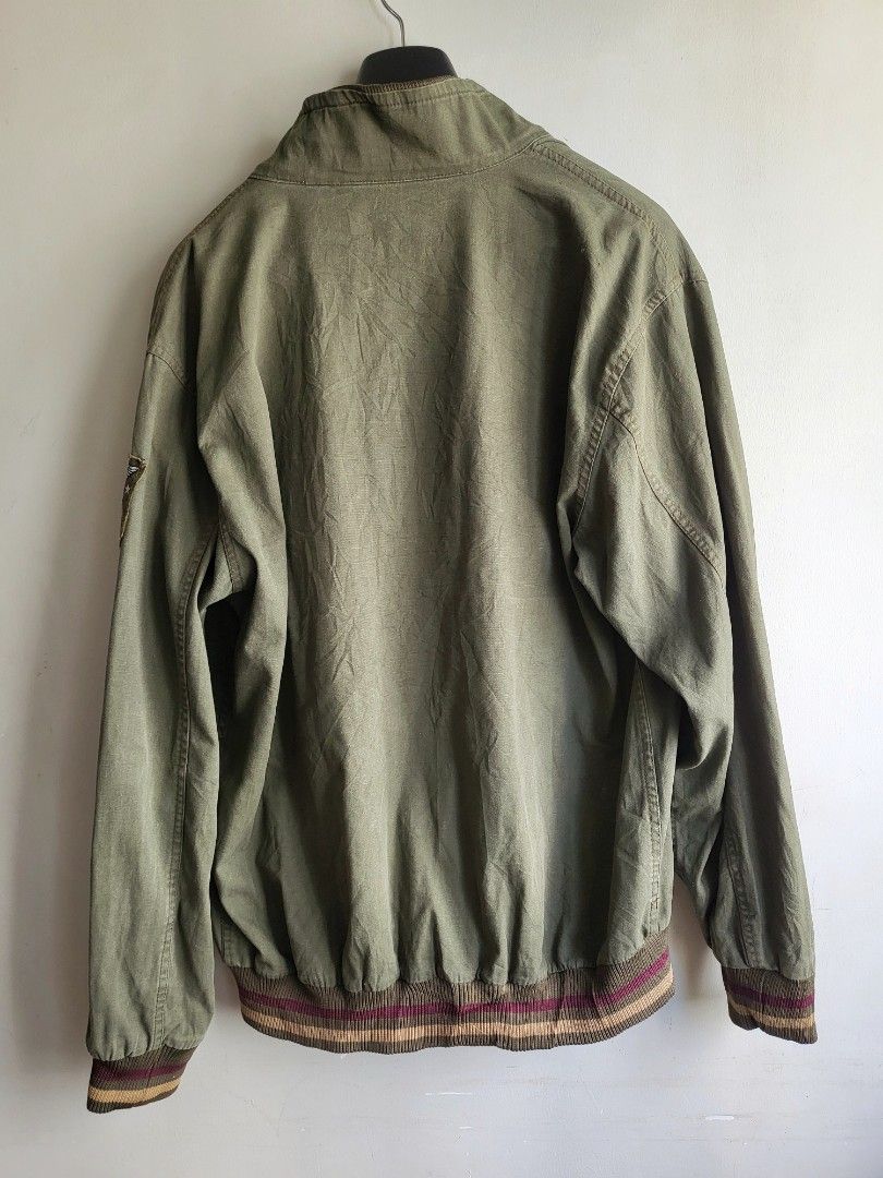US Army Green Military Field Jacket M65 (Category: Coats, Jackets and Outerwear) located in Makati City. Submitted by RedStore (Listing ID 1337259775, Image 3). Description: US Army Green Military Field Jacket (M-L) Excellent Condition Buttons, zipper, collar and cuffs in great condition Badges in excellent shape Actual size via tape measure Width 24.5 Length 28.5 Pinhole near the arm patch (see pic) 9/10 Color rate Php 800 Call /text 09299560779