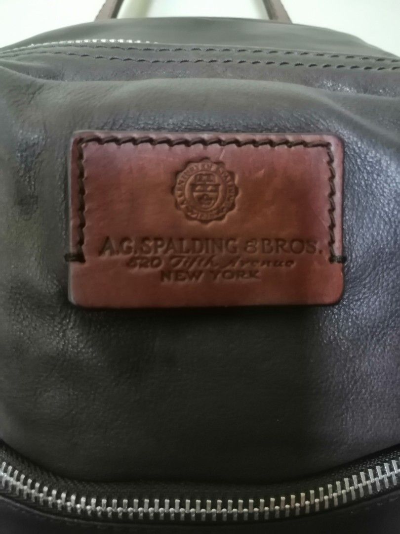 A.G. Spalding & Bros Backpack (Category: Backpacks) located in Quezon City. Submitted by annyeong9 (Listing ID 1337565277, Image 2). Description: A.G. Spalding Bros Brown leather backpack. Classic and elegant. Rare and vintage. P2000. No flaws. Zippers are in good condition. Due to camera lighting, actual color of the bag at times differs. PM for details and price..