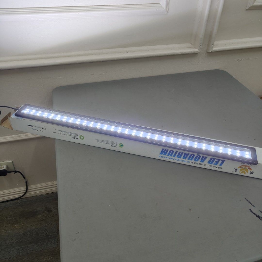 Aquarium LED lights 15 watts White (Category: Homes & Other Pet Accessories) located in Manila. Submitted by rossinicalabig (Listing ID 1337475540, Image 2). Description: 700 Pesos only Very good condition. For 35-50 gallon aquarium. 15 watts White LED light. Check & pickup at our photo studio in Sta.Mesa Mla..