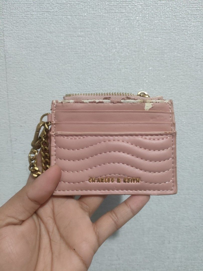 Charles & Keith Coin Purse (Category: Luxury Bags & Wallets) located in Pasig City. Submitted by igustnik (Listing ID 1337580886, Image 1). Description: SEE PICS FOR HONEST FLAWS WHAT U SEE IS WHAT YOU'LL GET BAWAL SA MAARTE ORIGINAL NO BOX YAN LANG FLAWS.