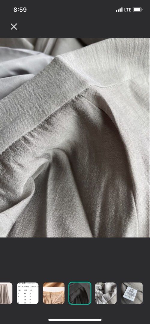 Grey Tencel A Line Skirt (Category: Skirts) located in Singapore. Submitted by lacedtsme (Listing ID 1337417508, Image 2). Description: Colour is exact to the close up photos V cool skirt to wear in hotter weathers .