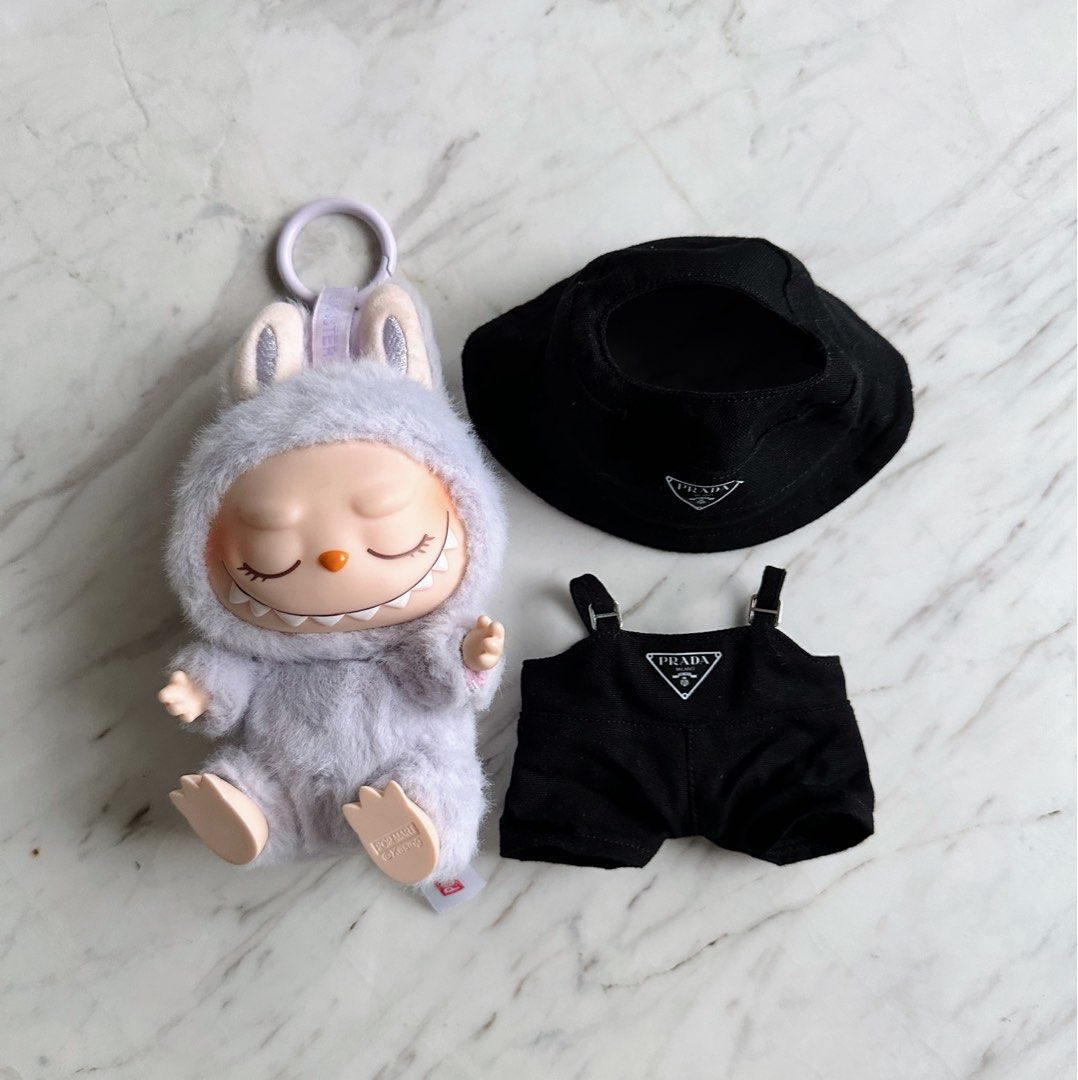 Labubu B2 Have a Seat - ZIZI (Category: Designer & Blind Box Toys) located in Quezon City. Submitted by mjcong (Listing ID 1337485703, Image 1). Description: Guaranteed Authentic 💯 Complete with box, plastic pouch & character card No issues Comes with a set of clothes (hat & romper) FYI: cut the long label at the bottom cause I find it too long..