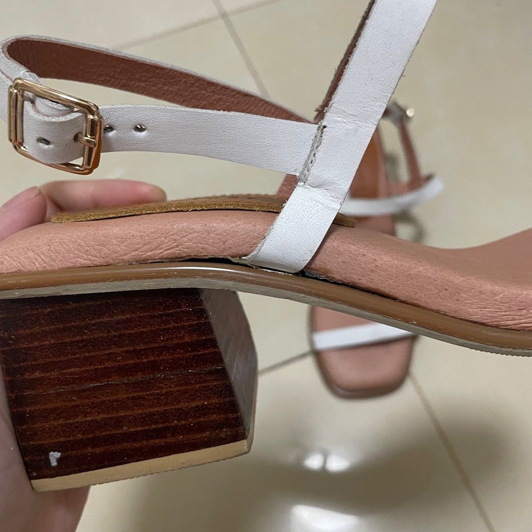 Meraniel Tina White Leather Heels Sandals (Category: Heels) located in Malabon City. Submitted by aya.papaya (Listing ID 1337496610, Image 3). Description: - from the IG brand Meraniel - all genuine leather - size 5, follows standard EU sizing (i’m usually a 5-5.5 for sandals but 6 for shoes) - 2” heels - double padded soft insoles - with signs of wear! condition is posted in the pics - really nice but it’s not being used so i’m willing to let th