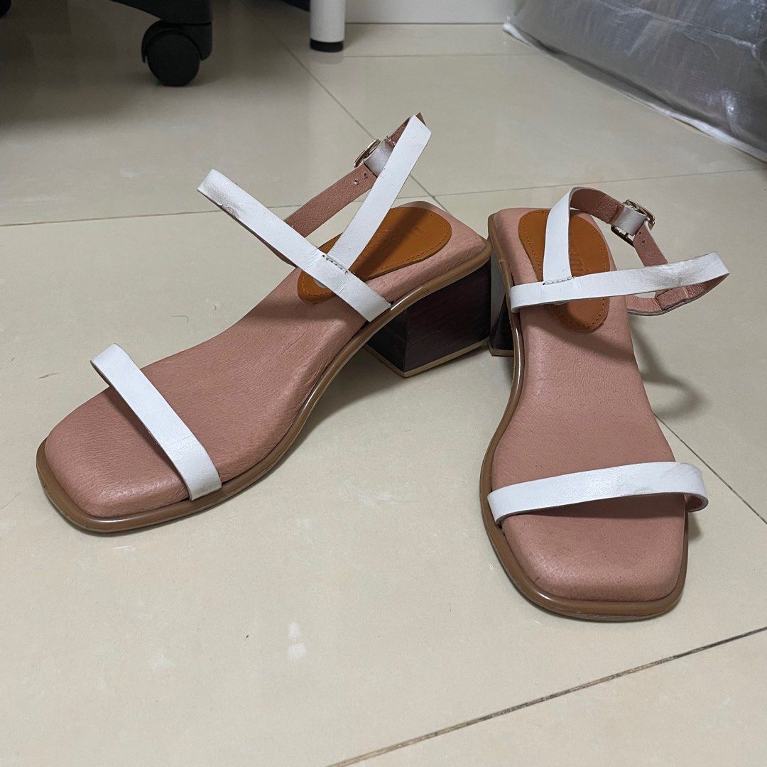 Meraniel Tina White Leather Heels Sandals (Category: Heels) located in Malabon City. Submitted by aya.papaya (Listing ID 1337496610, Image 1). Description: - from the IG brand Meraniel - all genuine leather - size 5, follows standard EU sizing (i’m usually a 5-5.5 for sandals but 6 for shoes) - 2” heels - double padded soft insoles - with signs of wear! condition is posted in the pics - really nice but it’s not being used so i’m willing to let th