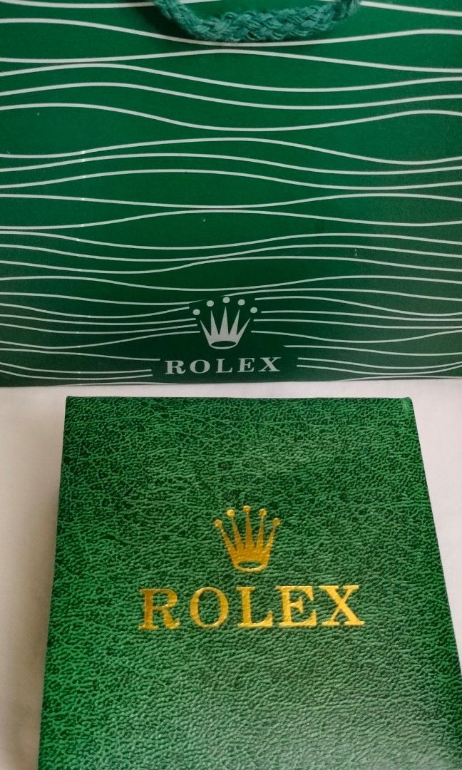 RLX watch unisex (Category: Luxury Watches) located in Mandaluyong City. Submitted by ten18Echo (Listing ID 1337428791, Image 2). Description: pasalubong from SG too big for me 40 to 41mm pink openback with box and paperbag selling low may discount sure buyer.