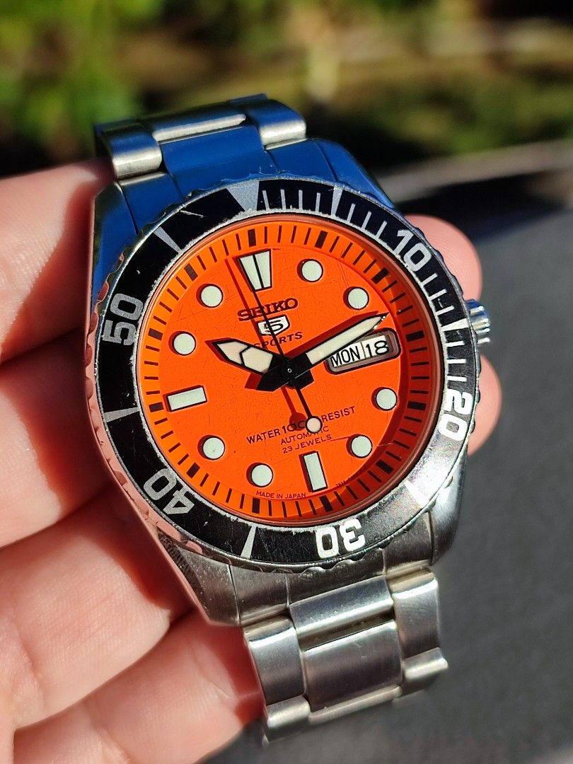 Seiko 5 Watch SNZF19 Orange "Urchin" (Category: Men's Watches) located in Quezon City. Submitted by NiceWatchPare (Listing ID 1337497922, Image 1). Description: 🔖SALE: Orange Urchin/Baby Sumo It's not Your usual Urchin variant 🧡 Alternative to the 🍊 Monster & SKX011 -All original watch with good running movt. -Dial, hands, chapter ring in mint condition -Bracelet with normal wear fits 7.5" -Case has some dings and dents -Lowest market price ✅M