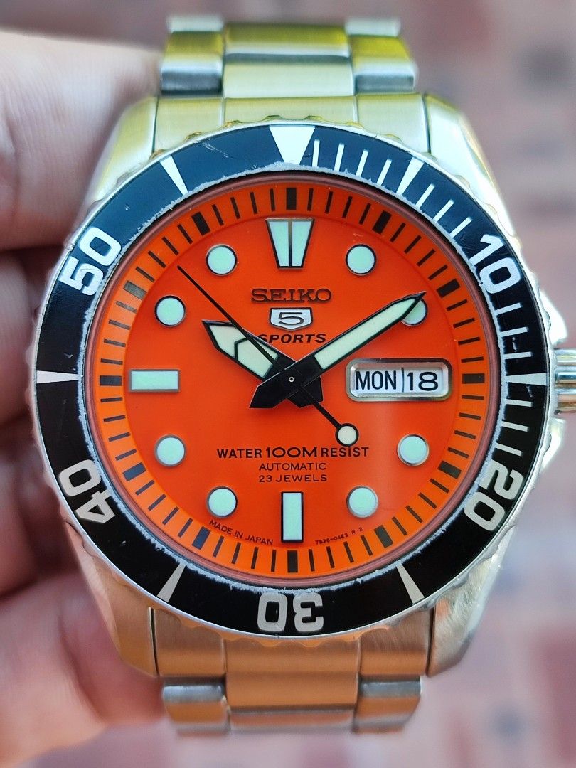 Seiko 5 Watch SNZF19 Orange "Urchin" (Category: Men's Watches) located in Quezon City. Submitted by NiceWatchPare (Listing ID 1337497922, Image 3). Description: 🔖SALE: Orange Urchin/Baby Sumo It's not Your usual Urchin variant 🧡 Alternative to the 🍊 Monster & SKX011 -All original watch with good running movt. -Dial, hands, chapter ring in mint condition -Bracelet with normal wear fits 7.5" -Case has some dings and dents -Lowest market price ✅M