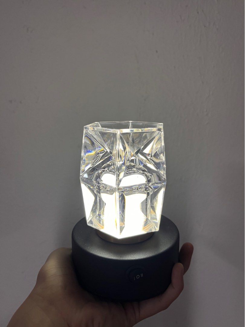 Table lighting centrepiece (Category: Other Home Decor) located in Singapore. Submitted by districtsoflove (Listing ID 1337542432, Image 1). Description: Used once for a dinner setup. Have more than 20 of these items. Guaranteed good condition. 2 different light settings. Chargeable using USB C. Very suitable for house decor or even parties/wedding decor. You can top up for delivery.
