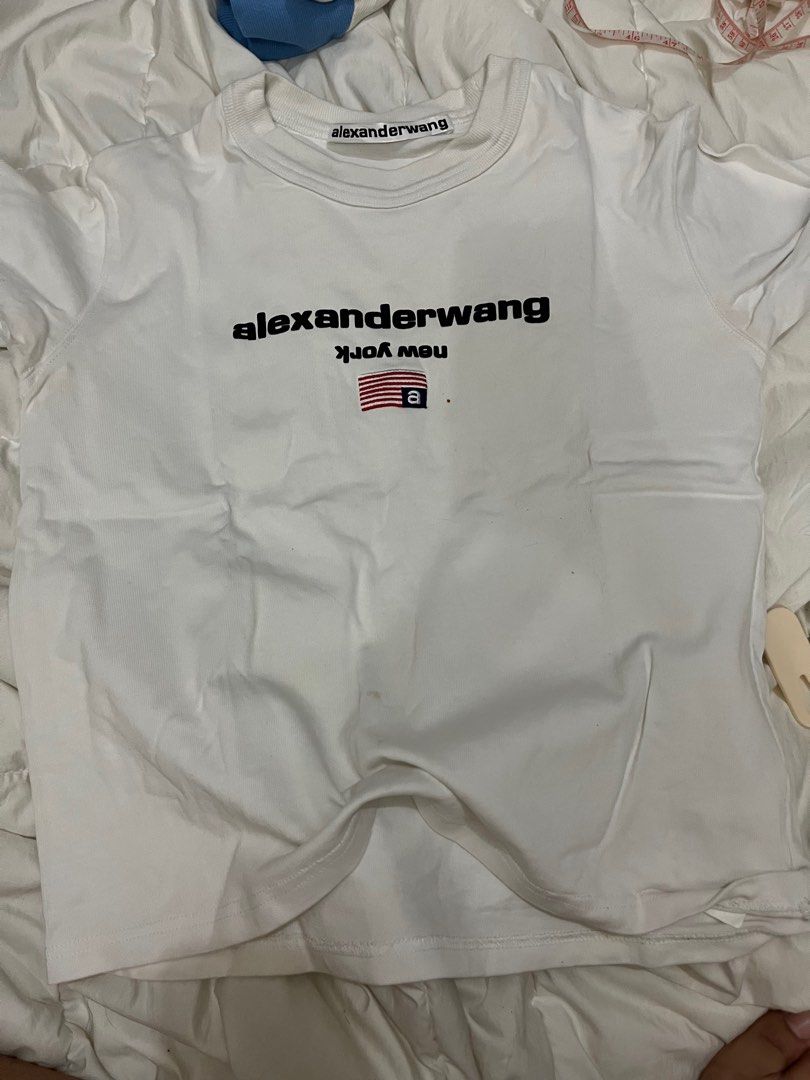 Alexander Wang White Shirt (Category: Luxury Apparel) located in Manila. Submitted by kimmygarcia (Listing ID 1337710651, Image 1). Description: With minor flaw can be removed after washing Japan source Not GA see width length .