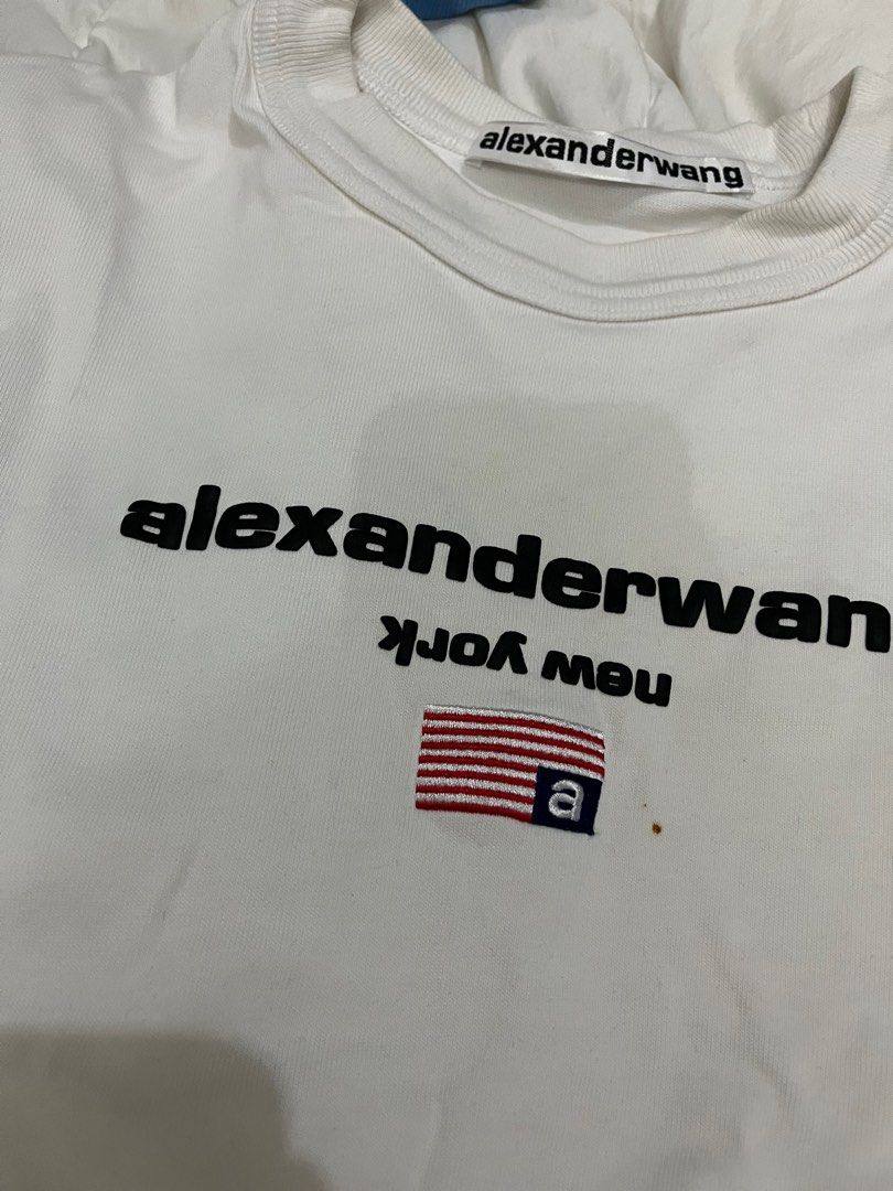 Alexander Wang White Shirt (Category: Luxury Apparel) located in Manila. Submitted by kimmygarcia (Listing ID 1337710651, Image 2). Description: With minor flaw can be removed after washing Japan source Not GA see width length .