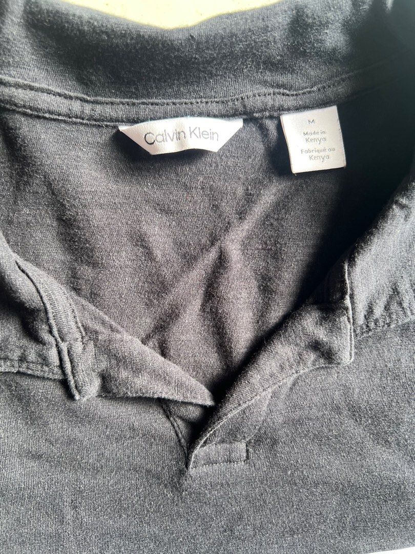 Calvin Klein Polo (Category: Tshirts & Polo Shirts ) located in Paranaque City. Submitted by raphaels_things (Listing ID 1337658627, Image 3). Description: Black Open/No-Button Polo Meetups can be arranged near BF Homes. Shipping fee is care of buyer..