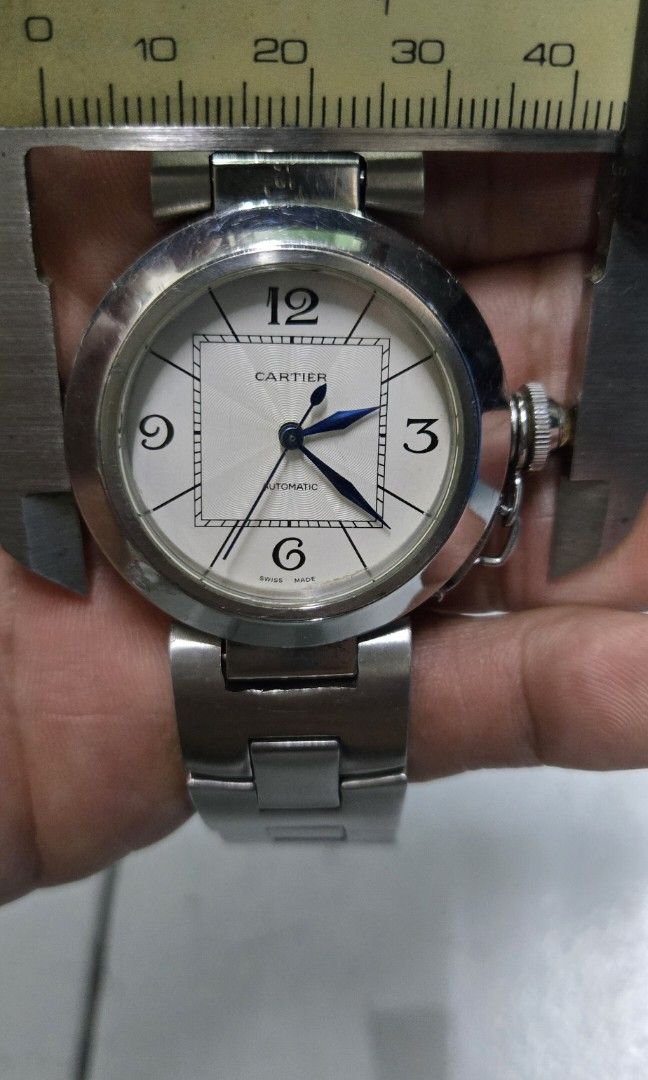 Cartier pasha (Category: Men's Watches) located in Caloocan City. Submitted by thegreat. (Listing ID 1337638908, Image 1). Description: good running condition all stainless steel [[ not for sensitive people ]] bracelet came from other watch all solid link bracelet original pls double check photo attached for the issue of appearance swiss eta engine automatic movement swiss as is only ( 50. k. salute).