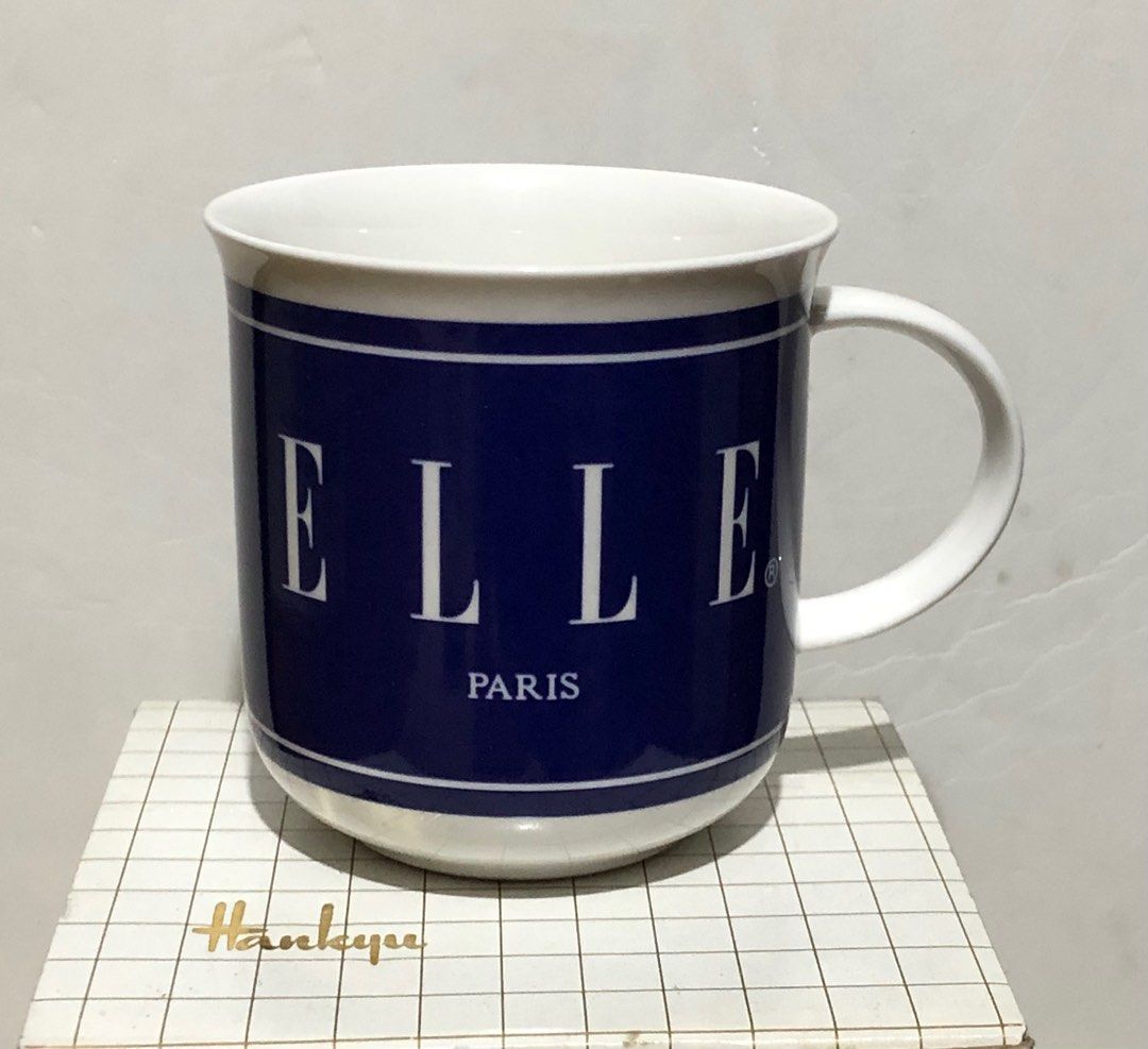 ELLE PARIS MUG (Category: Coffee & Tea Tableware) located in Caloocan City. Submitted by e_o62059 (Listing ID 1337707559, Image 1). Description: Japan branded brand new in original box; pristine condition; unused ;NIKKO porcelain Size- D8.5cm/3.3in H3.4in/8.7cm L 4.3in/11cm (w/ holder).