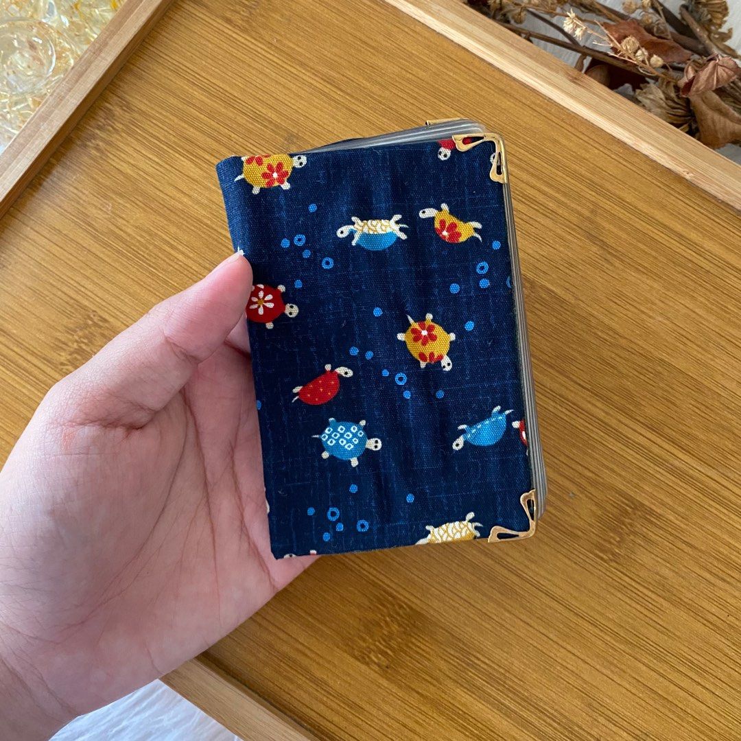 Japanese Fabric Card Holder (Category: Wallets & Card holders) located in Manila. Submitted by apolloshop (Listing ID 1337589462, Image 2). Description: Japanese Fabric Card Holder •20 pockets •country of origin: japan •condition: brand new •dimension: 7cm x 1cm x 10cm ₱89.