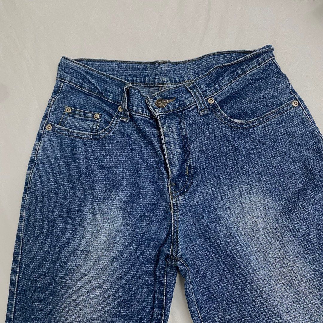 Low waist flared jeans medium to dark wash (Category: Jeans) located in Mandaluyong City. Submitted by fuhtile (Listing ID 1337741283, Image 3). Description: Measurements: Waist 25” Length 39”.