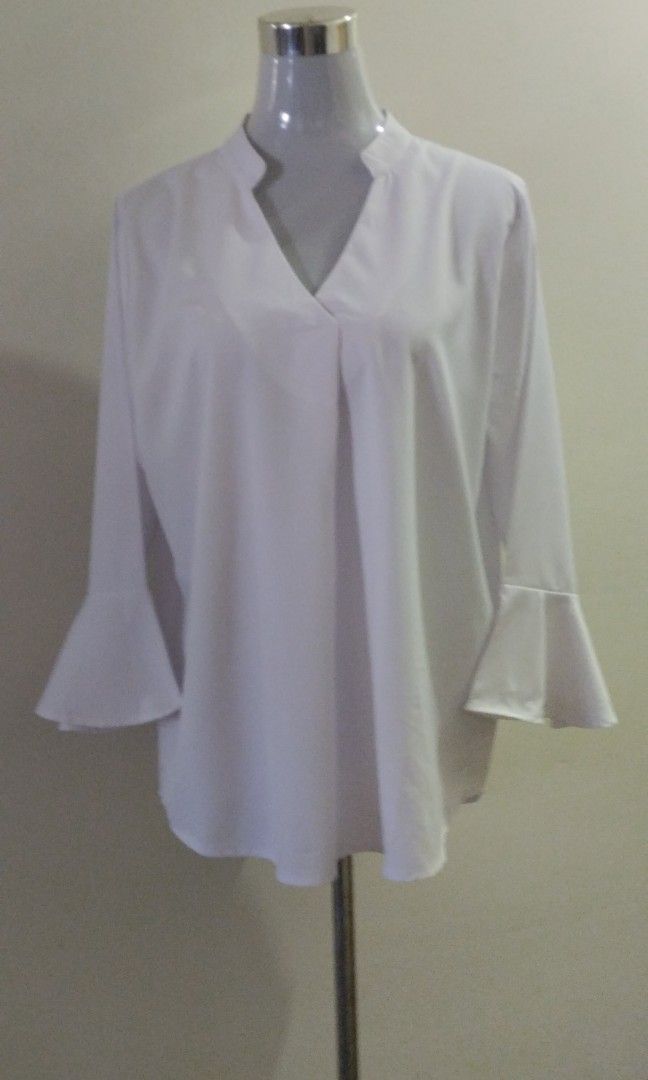 MISSLOOK bell sleeve white tops (Category: Blouses) located in Bacoor. Submitted by gbazaar (Listing ID 1337600851, Image 1). Description: -excellent good condition -good as new -white color -v neckline -bell sleeves -polyester chiffon material -misslook brand -made in China -xl size -shoulder 16.5" -chest 22" -sleeves 19" -length 28 1/2" Product may vary due to lighting MOP - gcash.
