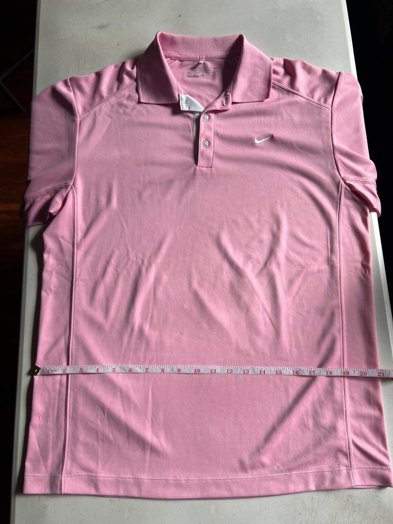 Nike Golf Polo (Category: Activewear) located in Paranaque City. Submitted by raphaels_things (Listing ID 1337658158, Image 2). Description: Pink Nike Drifit Golf Polo Replaced buttons for better look. Meetups can be arranged near BF Homes. Shipping fee is care of buyer..