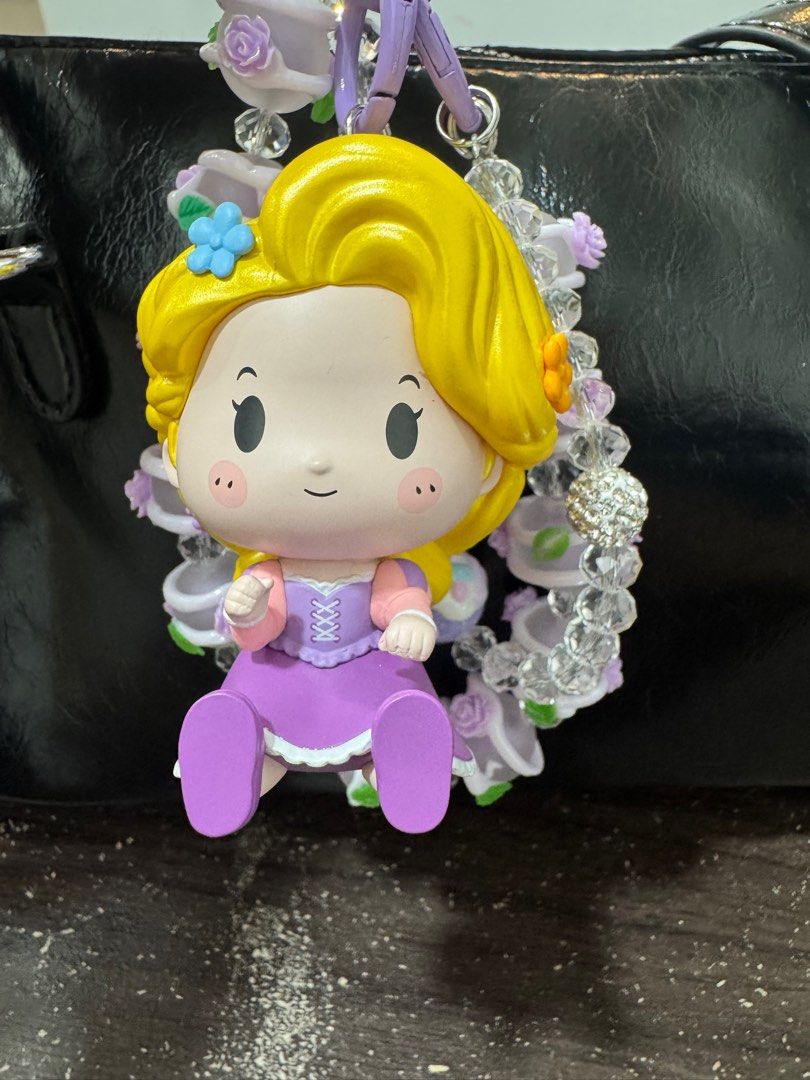 Rapunzel Popmart Charm (Category: Designer & Blind Box Toys) located in Taytay. Submitted by yamsulitdmd (Listing ID 1337617592, Image 1). Description: Authentic popmart figure. Comes with original box and accessories. Can be used as phone or bag charm. .