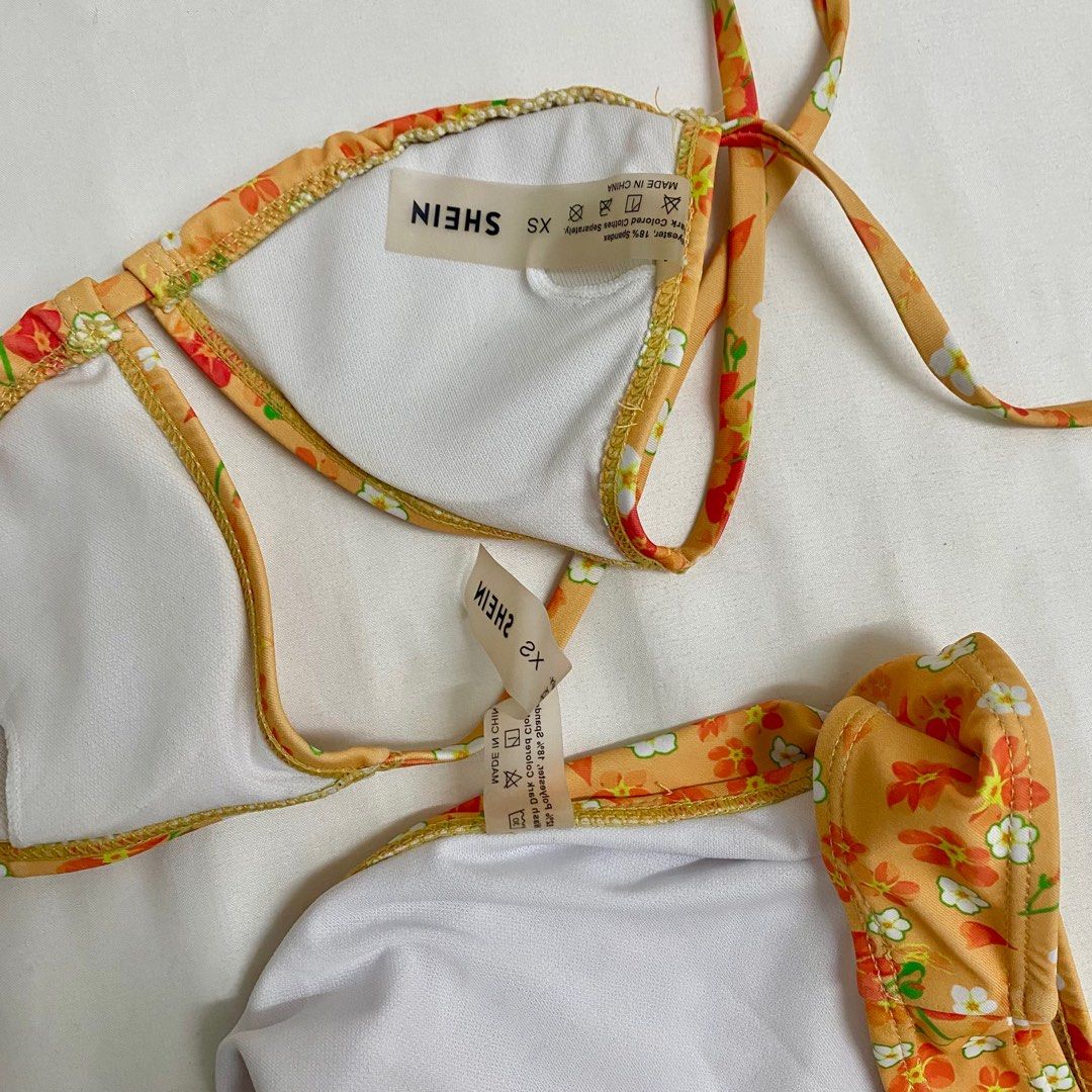 Shein orange floral bikini swimsuit (Category: Bikinis & Swimsuits) located in Mandaluyong City. Submitted by fuhtile (Listing ID 1337745139, Image 2). Description: Barely used.