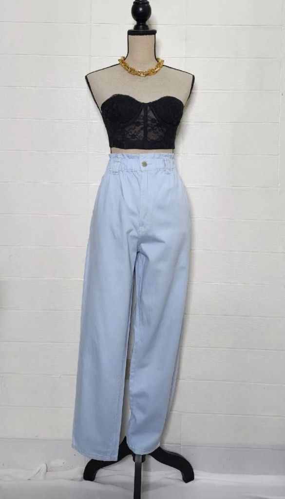 Light blue jeans (Category: Jeans) located in Pasig City. Submitted by heydeclutterist2nd (Listing ID 1337611396, Image 2). Description: Astradivarius medium-large, fits 28-32 garterized. Very nice and comfy. Highwaist paper bag pants Rfs:decluttering.