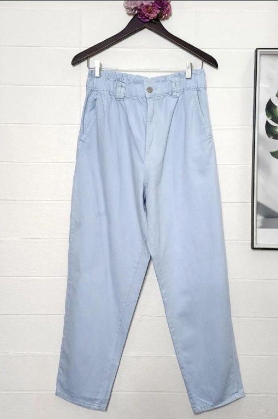 Light blue jeans (Category: Jeans) located in Pasig City. Submitted by heydeclutterist2nd (Listing ID 1337611396, Image 1). Description: Astradivarius medium-large, fits 28-32 garterized. Very nice and comfy. Highwaist paper bag pants Rfs:decluttering.