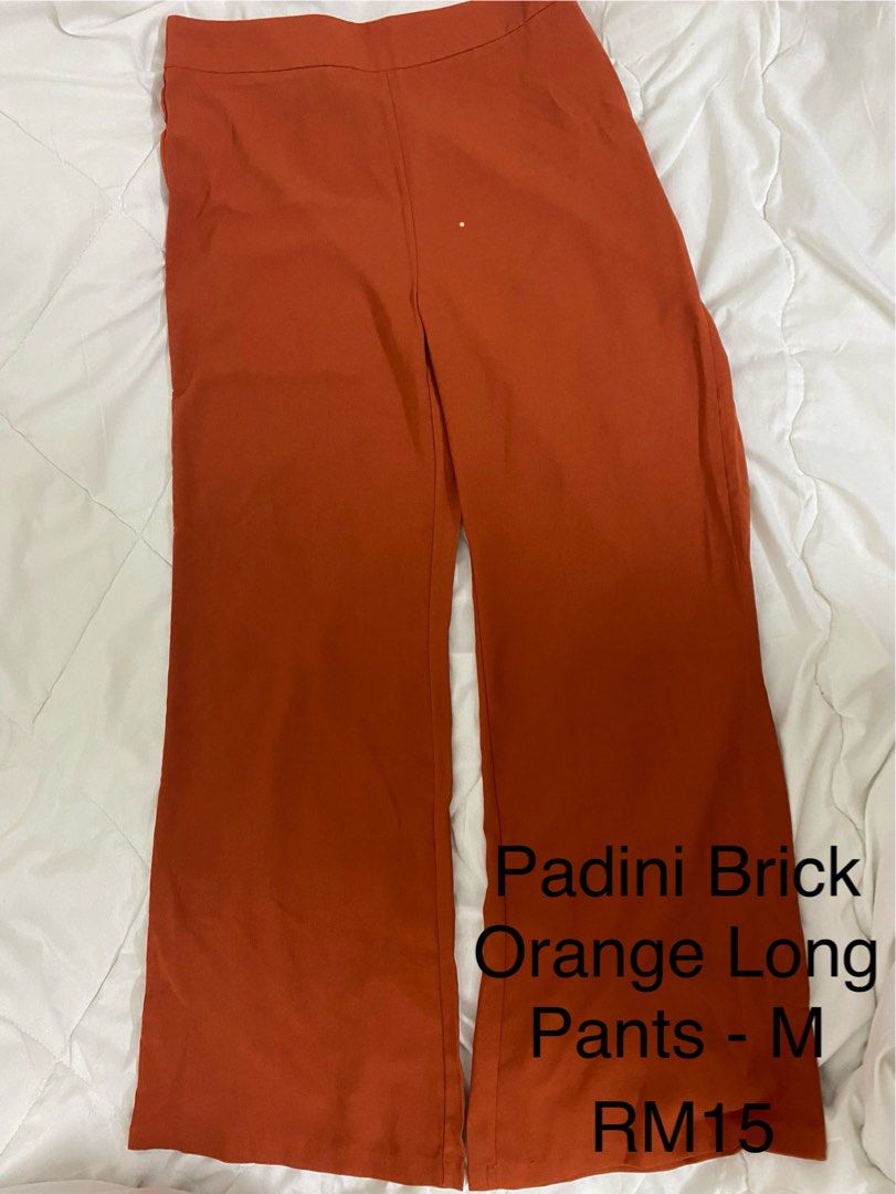Two piece set (Category: Sets or Coordinates) located in Subang Jaya. Submitted by aisyafiqah_ (Listing ID 1337672521, Image 2). Description: The pants are new and I’ve never used them. The top has been used a few times. The top fit is oversized while the bottom is I think true to size. It has a zipper on the side. It’s in brick orange. .