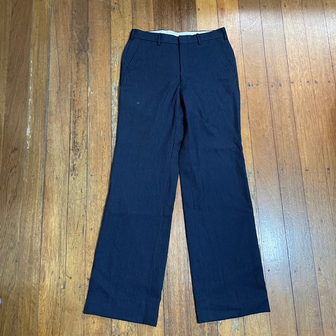 Vintage Wool Pinstripe Trousers (Category: Trousers) located in Manila. Submitted by mga_damit (Listing ID 1337689171, Image 1). Description: - Vintage Wool pinstripe trousers leg opening 9 length 40 waist 28 issues: repaired pinholes.