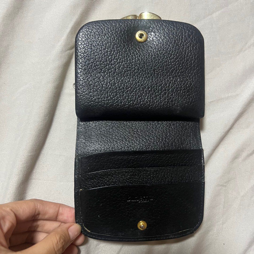 Burberry wallet (Category: Luxury Bags & Wallets) located in Manila. Submitted by devilwearsrara (Listing ID 1337885564, Image 3). Description: price + sf (loc bulacan/manila) with flaws (stitching, rubs) needs cleaning nego.