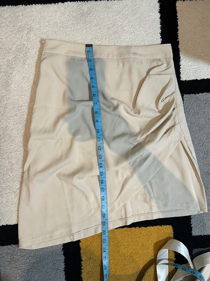 Dazy Beige Asymmetrical Tulip Skirt (Category: Skirts) located in Taguig. Submitted by abcshop512 (Listing ID 1337884705, Image 3). Description: Wasit 30inches Used only once RFS: Too loose now.