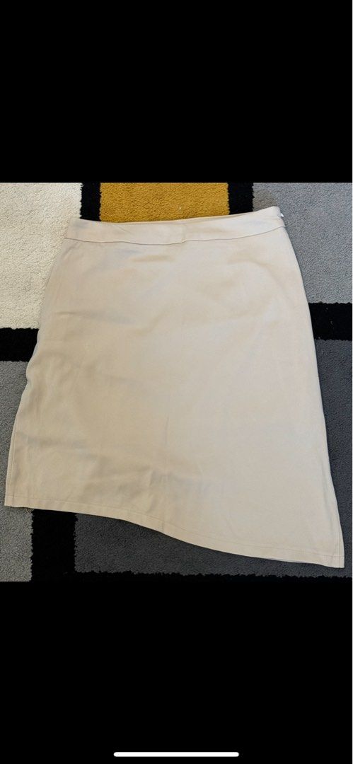 Dazy Beige Asymmetrical Tulip Skirt (Category: Skirts) located in Taguig. Submitted by abcshop512 (Listing ID 1337884705, Image 1). Description: Wasit 30inches Used only once RFS: Too loose now.