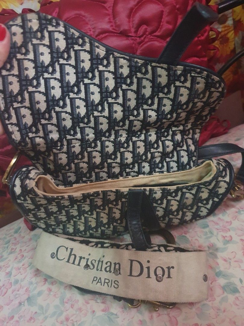 Dior saddle bag (Category: Luxury Bags & Wallets) located in Makati City. Submitted by britishheart (Listing ID 1337840475, Image 2). Description: selling this dior saddle.from japan suplus..bag is in good condition and with sling..some fadings on hardwares but only little gold is still dominant.