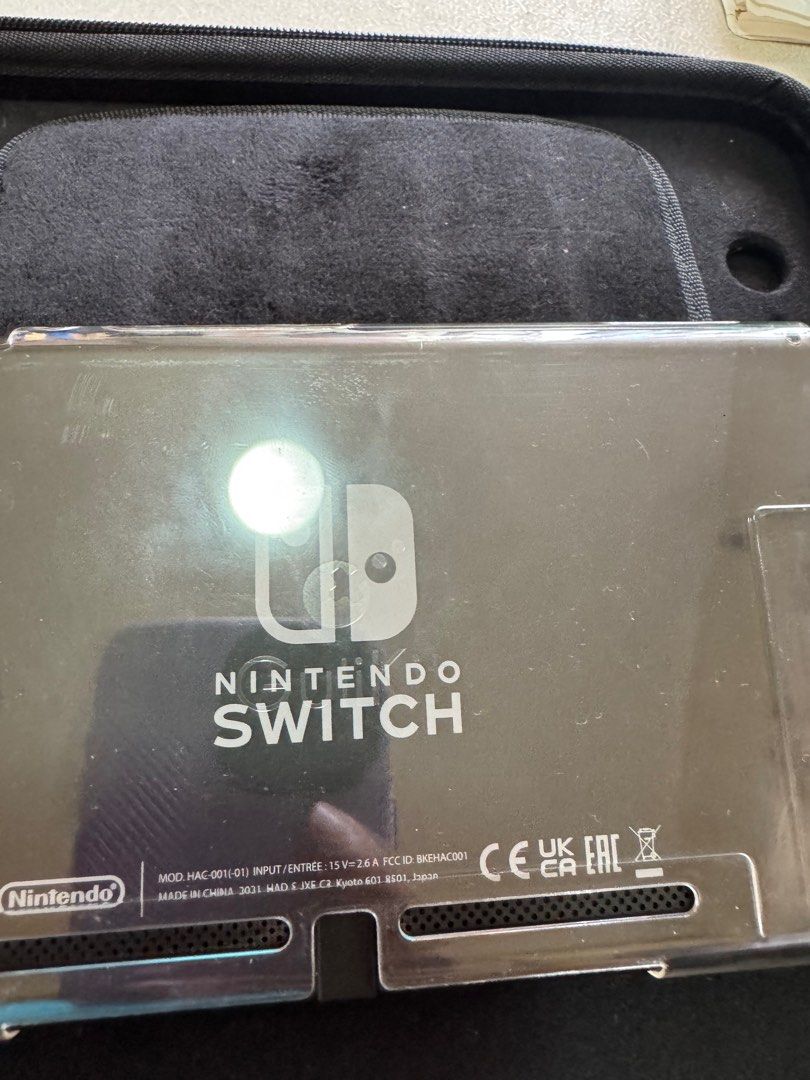 Nintendo Switch Ver.2 (Category: Nintendo) located in Pasig City. Submitted by crisbern23 (Listing ID 1337790776, Image 1). Description: Complete set with box Hardcase Additional Type C charger Physical Game- Just Dance 2019 Digital Game- Animal Crossing- New Horizon .