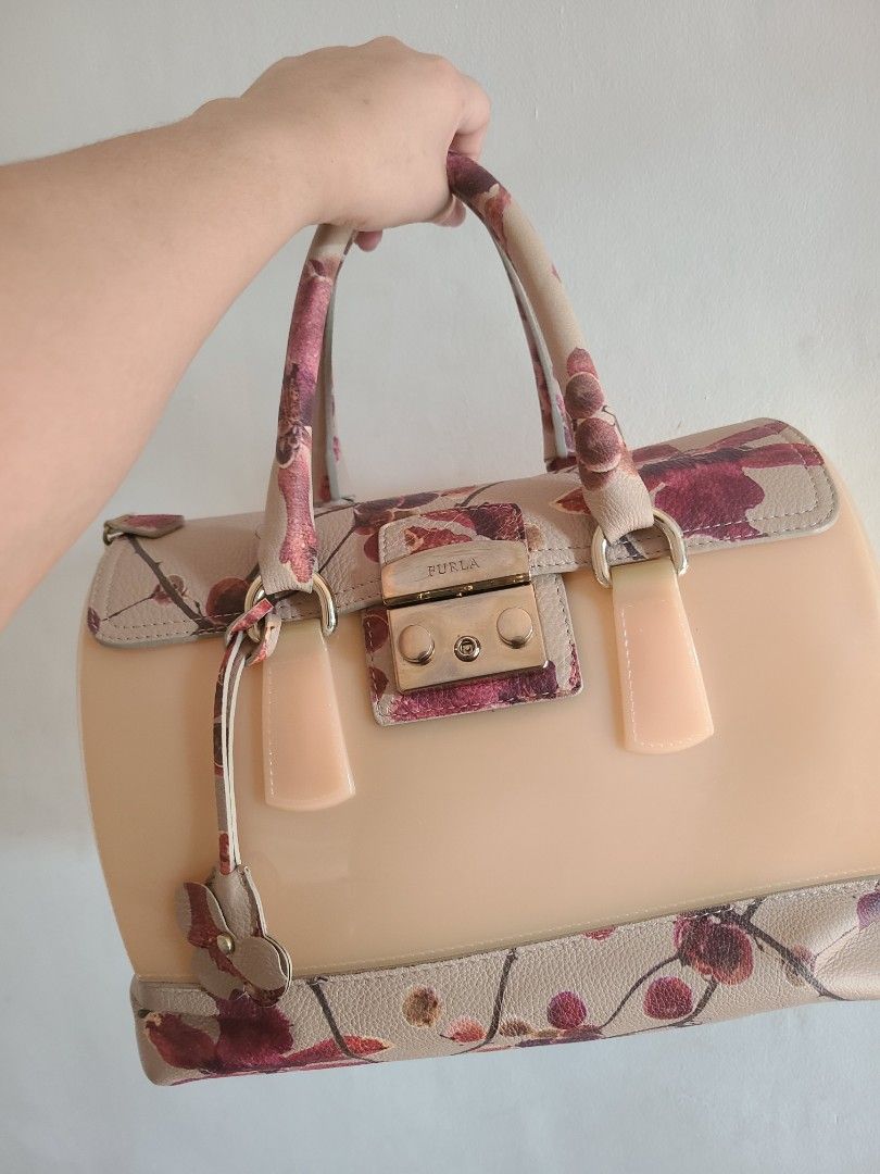 RARE Furla Candy Blossom Bag (Category: Luxury Bags & Wallets) located in Las Pinas. Submitted by prelovedbymharia (Listing ID 1337754866, Image 1). Description: This is a limited edition collection from Furla in 2011. It is considered a hard-to-find collection on the market. I'm selling it at a very low price because I need funds, but the price is still negotiable. The bag has only one minor flaw, which you can see in the last picture..