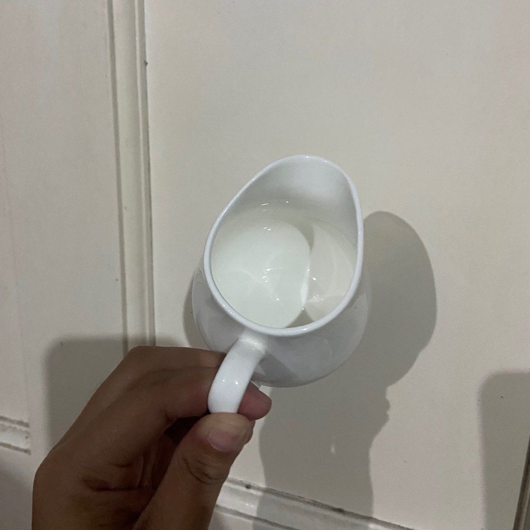 White Ceramic Creamer Pitcher (Category: Coffee & Tea Tableware) located in Taguig. Submitted by nessyyy (Listing ID 1337876623, Image 3). Description: Japan Surplus -75 each (120 pesos for two) Mode of Delivery: Lalamove or JnT only Mode of Payment: Gcash only.