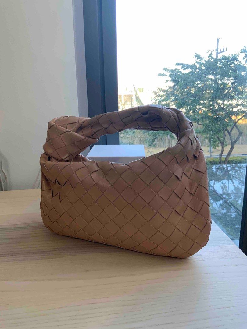 Bottega Veneta Jodie (Mini) (Category: Luxury Bags & Wallets) located in Makati City. Submitted by Chimochi (Listing ID 1337306347, Image 2). Description: 100% Authentic a small flaw or dirt as seen in the photo but can be sent to a bag spa Last price. No to lowballers.