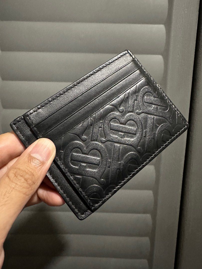 Burberry Black Monogram Bernie Card Holder (Category: Luxury Bags & Wallets) located in Quezon City. Submitted by dpkuno (Listing ID 1338065348, Image 2). Description: Personally used May scratch sa bottom part see last pic Interested? PM is the 🔑. Pagusapan natin Grained calfskin card holder in black. Embossed logo pattern at front and back faces. Six card slots and three note slots. Tonal textile lining. Approx. 4.25 length x 3.25 height..