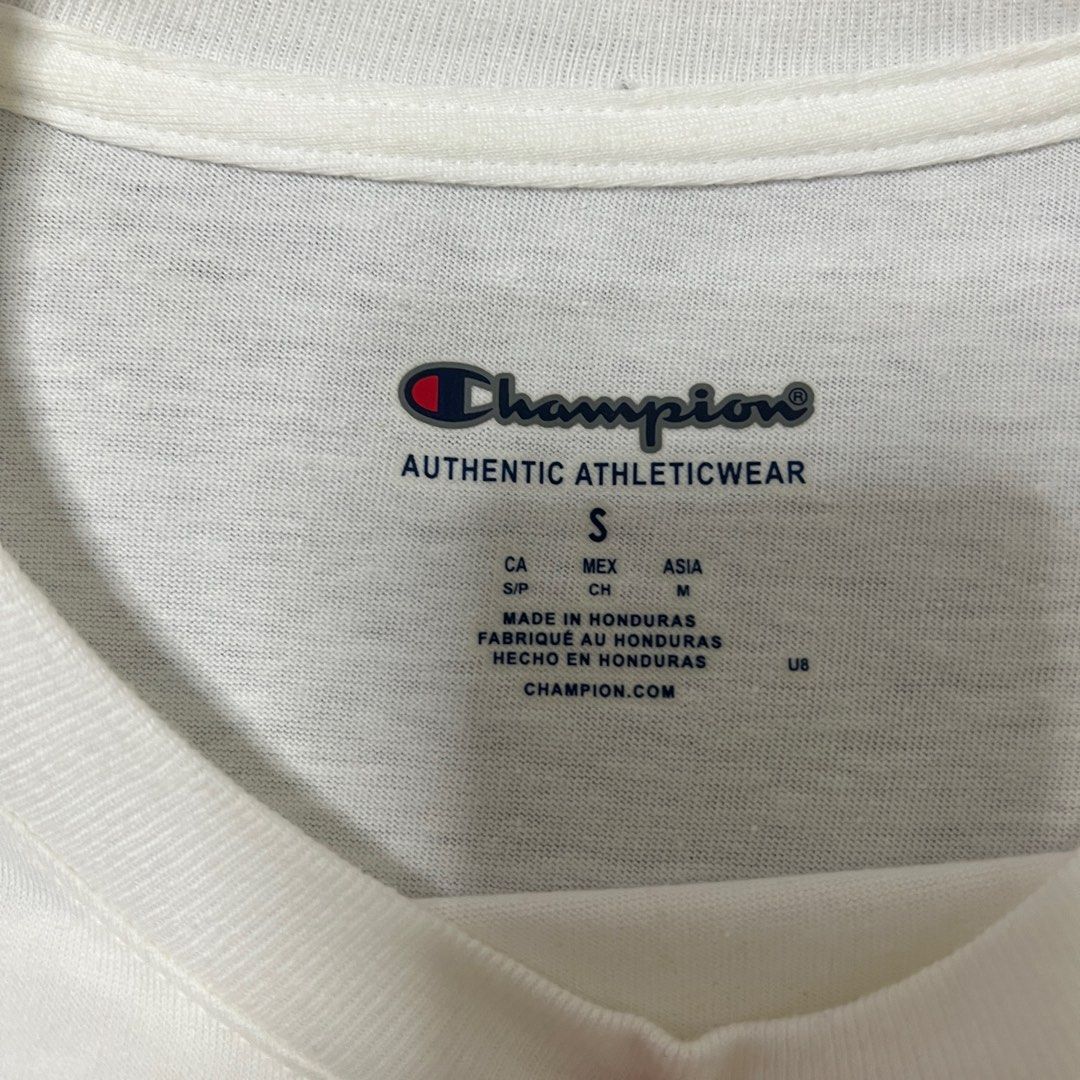 Champion Basic White Tee (Category: Shirts) located in Singapore. Submitted by juleeah (Listing ID 1338030925, Image 3). Description: Bought from USA. Tried in store but never wore it after buying because I got bigger 🥲 and it was men’s fitting. It do be a tiny bit see thru but hey if you’re confident, buy it from me please! 🙏🏻 .