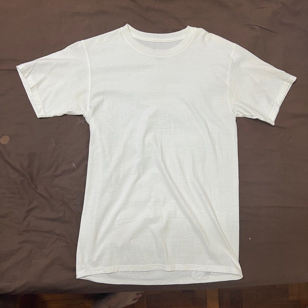 Champion Basic White Tee (Category: Shirts) located in Singapore. Submitted by juleeah (Listing ID 1338030925, Image 1). Description: Bought from USA. Tried in store but never wore it after buying because I got bigger 🥲 and it was men’s fitting. It do be a tiny bit see thru but hey if you’re confident, buy it from me please! 🙏🏻 .