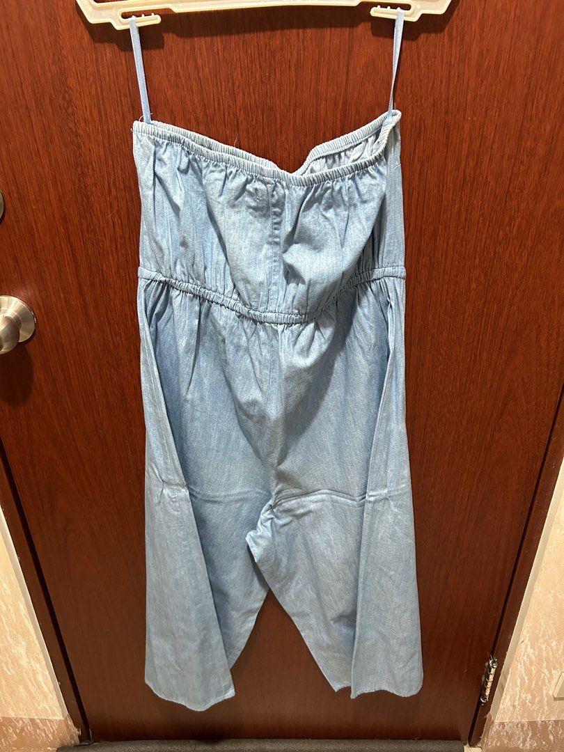 Cotton on soft denim jumpsuit (Category: Jumpsuits) located in Manila. Submitted by sicataf (Listing ID 1337936171, Image 2). Description: Very comfortable. Issue included in the pictures but barely noticeable when worn. Great for beach cover up / errands. Shipping via lalamove/grab/aks c/o buyer. Payment- gcash/bank transfer..