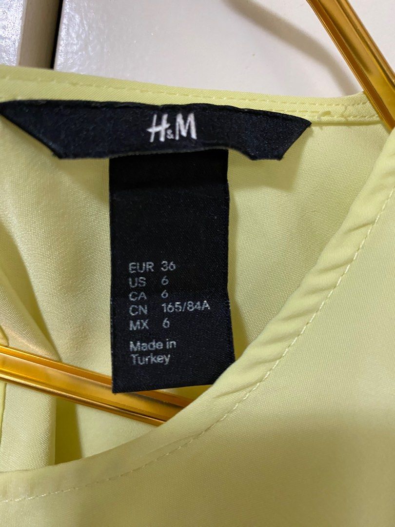 H&M Yellow Top (Category: Blouses) located in Pasig City. Submitted by espnyl07 (Listing ID 1337991493, Image 2). Description: Best fits Small to Medium.