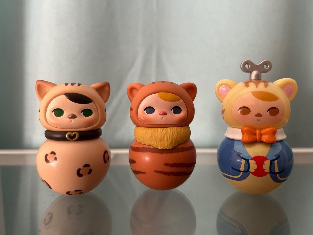 Pucky Roly Poly Kitty (Category: Designer & Blind Box Toys) located in Quezon City. Submitted by defkey (Listing ID 1327955908, Image 1). Description: Complete with box card foil Bengal Red Tabby Windup MOP: BPI, Maya, Gcash MOD: SDD, J&T, LBC.