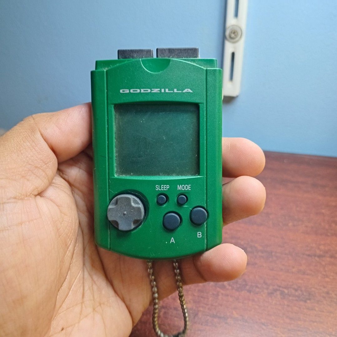 AUTH SEGA GODZILLA GREEN DREAM CAST VISUAL MEMORY (Category: Others) located in Pasig City. Submitted by akindzshop2 (Listing ID 1338130453, Image 1). Description: .
