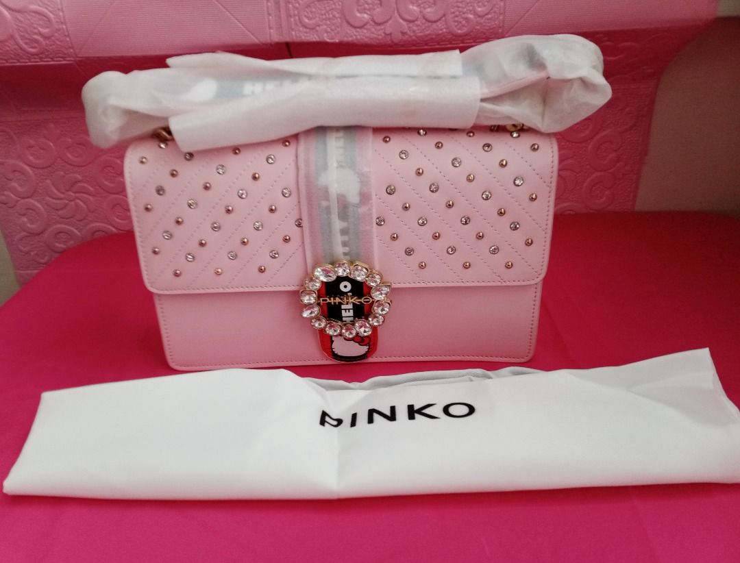 BRAND NEW Pinko x Hello Kitty bag (Category: Luxury Bags & Wallets) located in Quezon City. Submitted by janelyn888 (Listing ID 1338118701, Image 2). Description: Brand New Pinko x Hello Kitty bag pink color still with original cover and dustbag. Pls. pm/dm for ACTUAL price and other inquiries. .