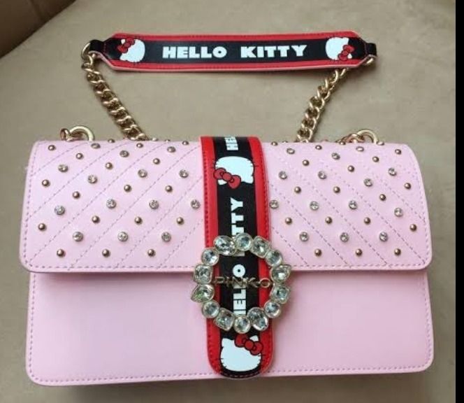 BRAND NEW Pinko x Hello Kitty bag (Category: Luxury Bags & Wallets) located in Quezon City. Submitted by janelyn888 (Listing ID 1338118701, Image 1). Description: Brand New Pinko x Hello Kitty bag pink color still with original cover and dustbag. Pls. pm/dm for ACTUAL price and other inquiries. .