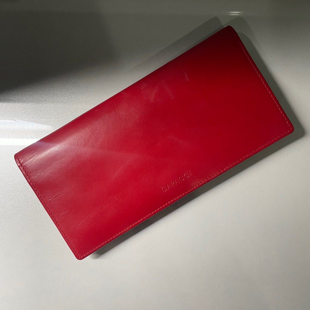 Capacci genuine leather red wallet (Category: Luxury Bags & Wallets) located in Antipolo. Submitted by jus10lian (Listing ID 1338217859, Image 1). Description: Free if you order from my items worth 2k up ☺️ No bakbak ng leather only scratches and stains.