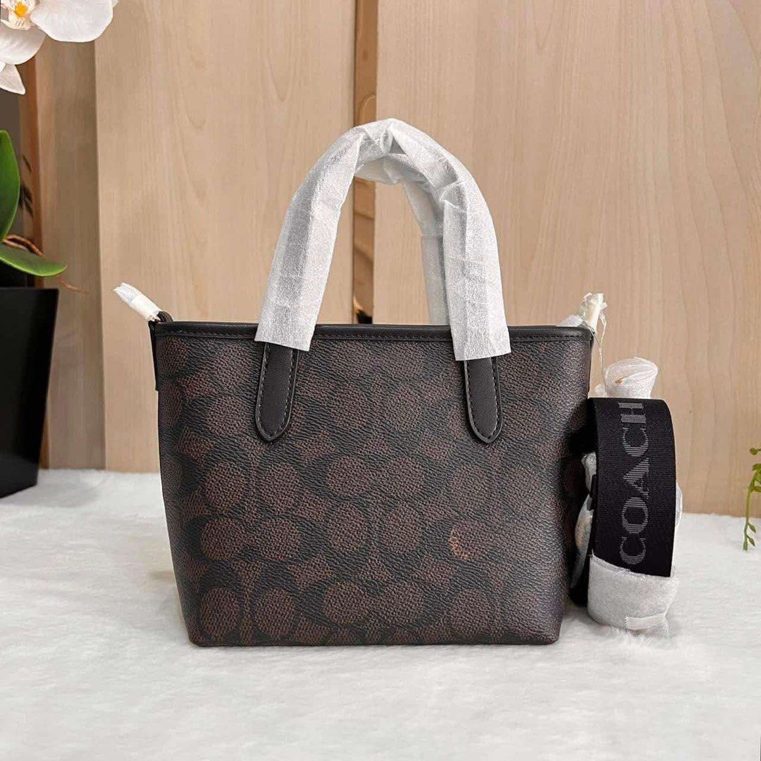 Coach City Mini Tote (Category: Luxury Bags & Wallets) located in Rizal. Submitted by LuxbyMarifrance (Listing ID 1338243797, Image 2). Description: 🏷️ 2,100 only + SF 🧳 Coach CITY MINI TOTE BAG 📏 6” (L) x 5 1/2” (H) x 3 1/2” 📌 with dust bag, paper bag and care card ✨All trademarks, logos and brand names are reserved and property of the original brand owners. #coachph #authenticqualitybagsph #authenticqualitybags #lowestpriceguaranteed #cochf